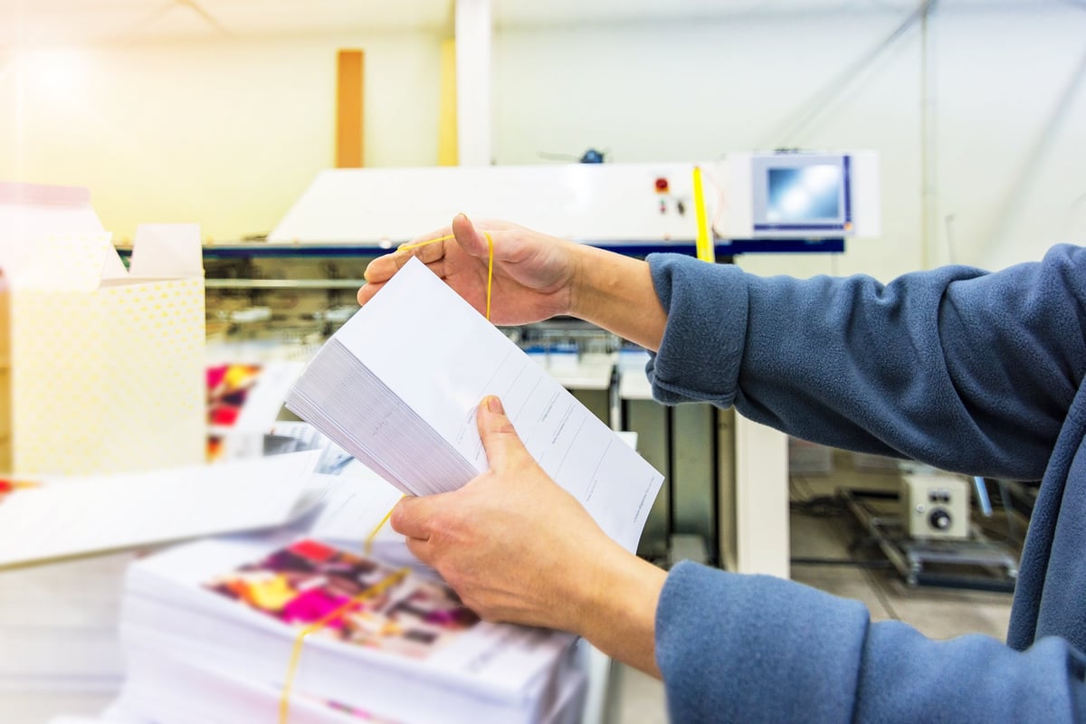 Work with paper in a printing press